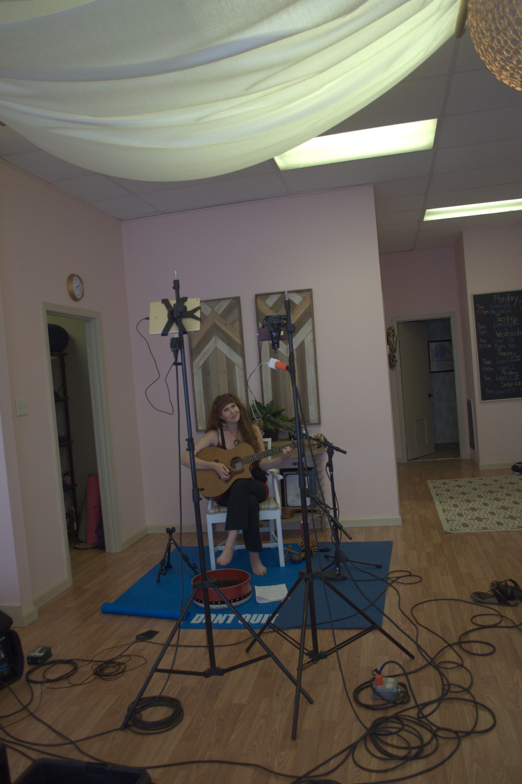 An audio, visual, lighting, and camera set up for a music performer.